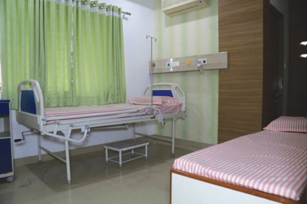 Deluxe Room KVT Hospitals